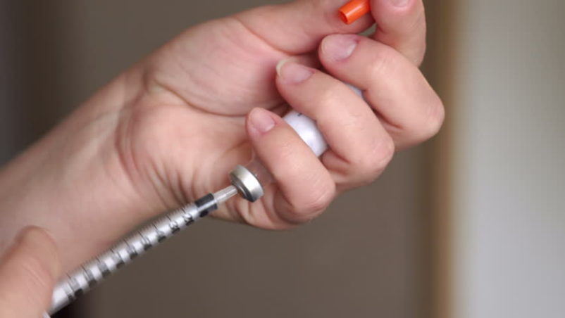 injecting insulin
