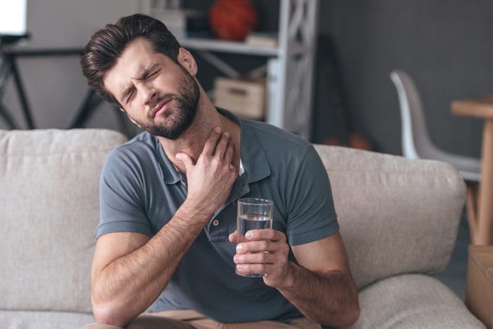 why is the flu marked by swallowing pain