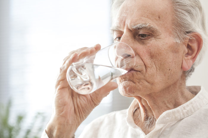 elderly drink water