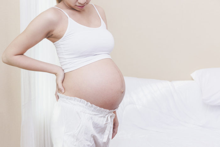 back pain during pregnancy using heating pad