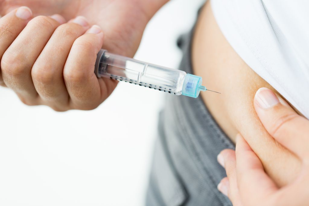 injecting insulin
